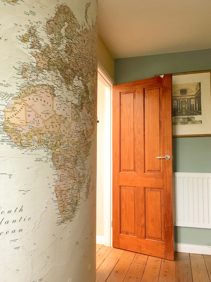 natural colored map wallpaper on rounded wall