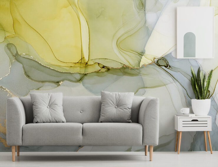 light grey and yellow watercolor effect wallpaper with grey couch