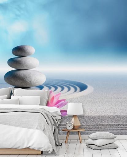 Staplade stenar, rosa Lotus på sand Bakgrund Staplade stenar, rosa Lotus på sand Bakgrund