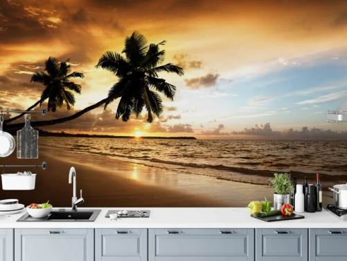 Mural de pared Atardecer en una playa tropical