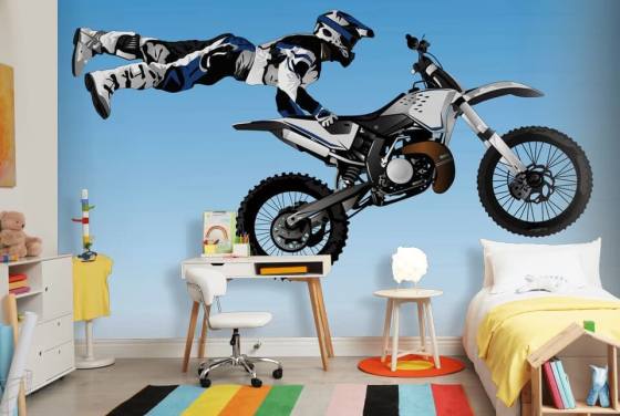 Motocross Biker Flying on Back of Bike Wallpaper