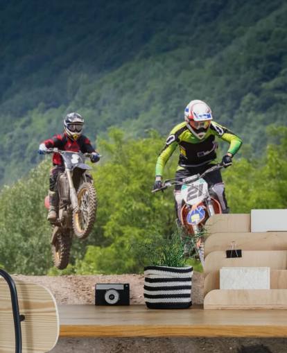 Motocross Racers Going Over a Hill Wallpaper Motocross Racers Going Over a Hill Wallpaper