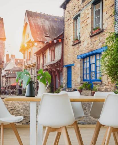 Charming street scene in an old town in Europe at sunset Wall Mural Wallpaper Charming street scene in an old town in Europe at sunset Wall Mural Wallpaper