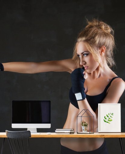 Sexy boxer woman making kick with boxing bandage mural Sexy boxer woman making kick with boxing bandage mural