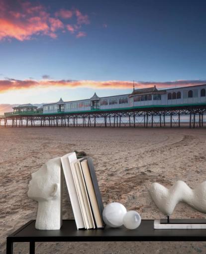 Strand og brygge på Sunset Bakgrunn Strand og brygge på Sunset Bakgrunn