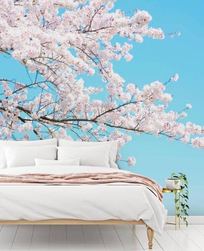 Rosa blomma mot en ljusblå himmel väggmålning Rosa blomma mot en ljusblå himmel väggmålning