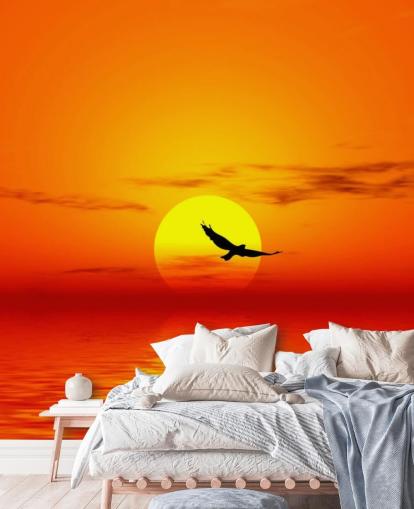 Bird Flying Over Ocean at Sunset Wall Mural Bird Flying Over Ocean at Sunset Wall Mural