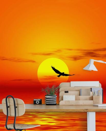 Bird Flying Over Ocean at Sunset Wall Mural Bird Flying Over Ocean at Sunset Wall Mural
