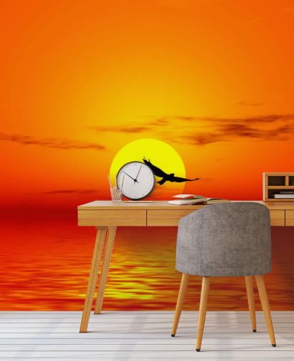 Bird Flying Over Ocean at Sunset Wall Mural Bird Flying Over Ocean at Sunset Wall Mural