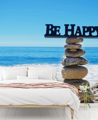Sign Be Happy on balanced rocks Sign Be Happy on balanced rocks