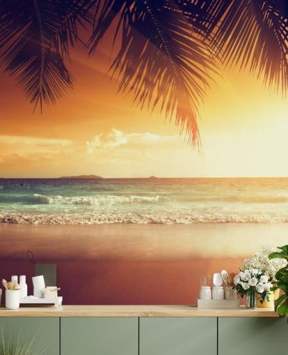 Oranssi auringonlaskun taivas trooppisella rannalla taustakuva Oranssi auringonlaskun taivas trooppisella rannalla taustakuva