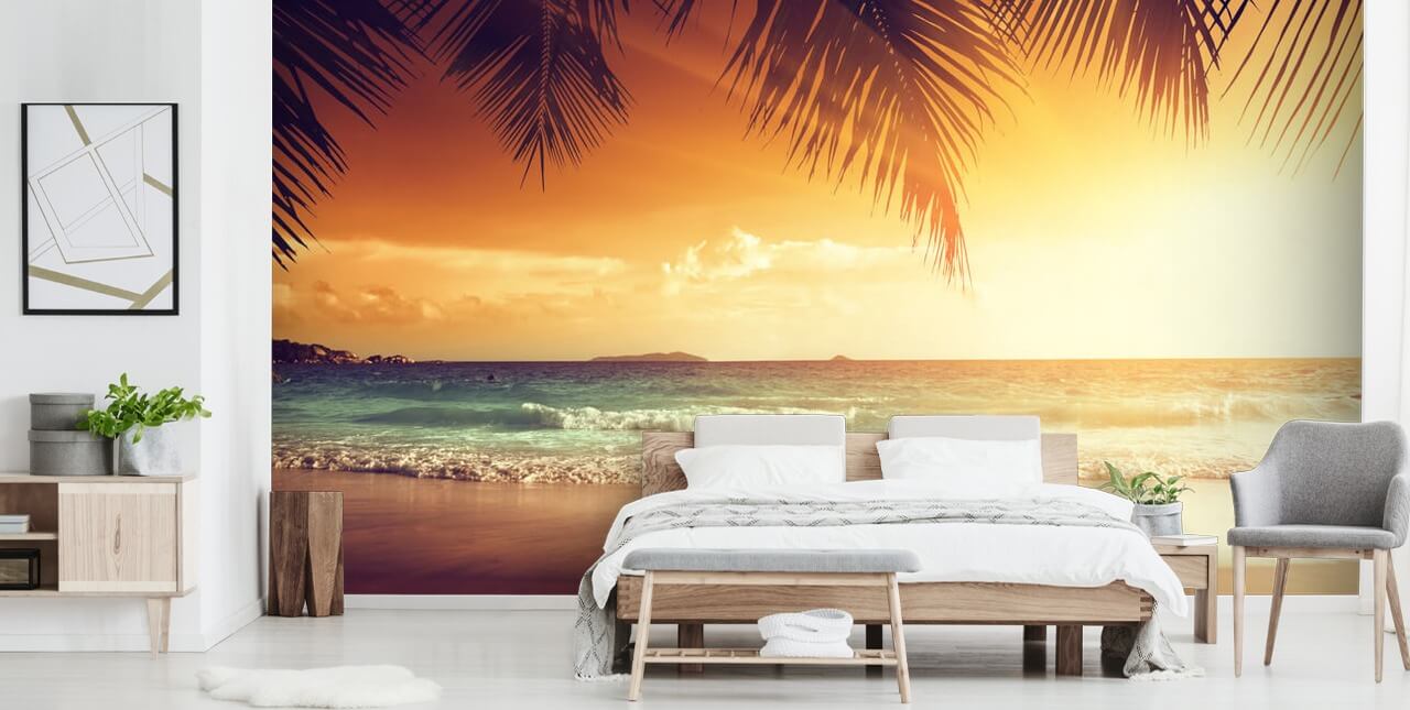 Orange Sunset Sky op tropisch strand behang