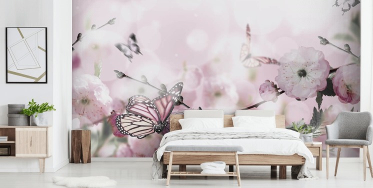 Flowers background with amazing spring sakura with butterflies. Flowers of cherries.