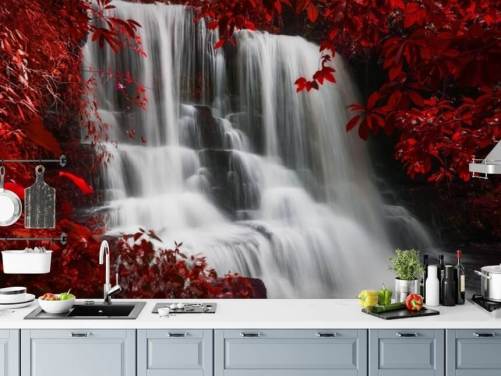 red leafed forest with waterfall wallpaper