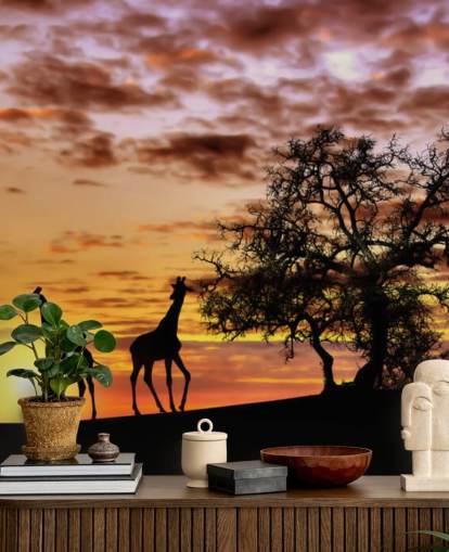 Giraffen- und Elefanten-Silhouetten vor Sonnenuntergangshimmel-Tapete Giraffen- und Elefanten-Silhouetten vor Sonnenuntergangshimmel-Tapete