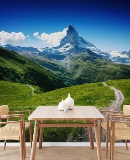 snowy peak of mountain above lush green field wallpaper snowy peak of mountain above lush green field wallpaper