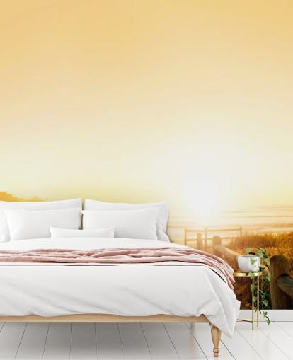 Pôr do sol dourado no mural da parede da praia Pôr do sol dourado no mural da parede da praia