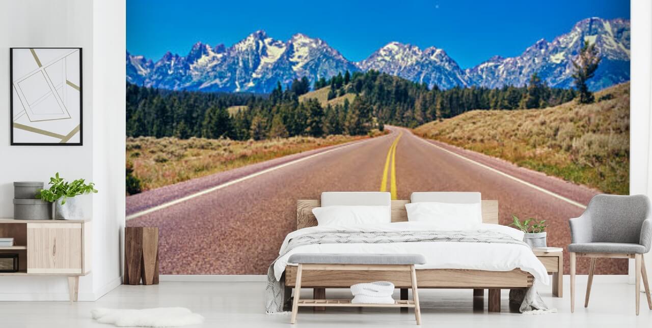 yellow lined road to blue mountain range wallpaper