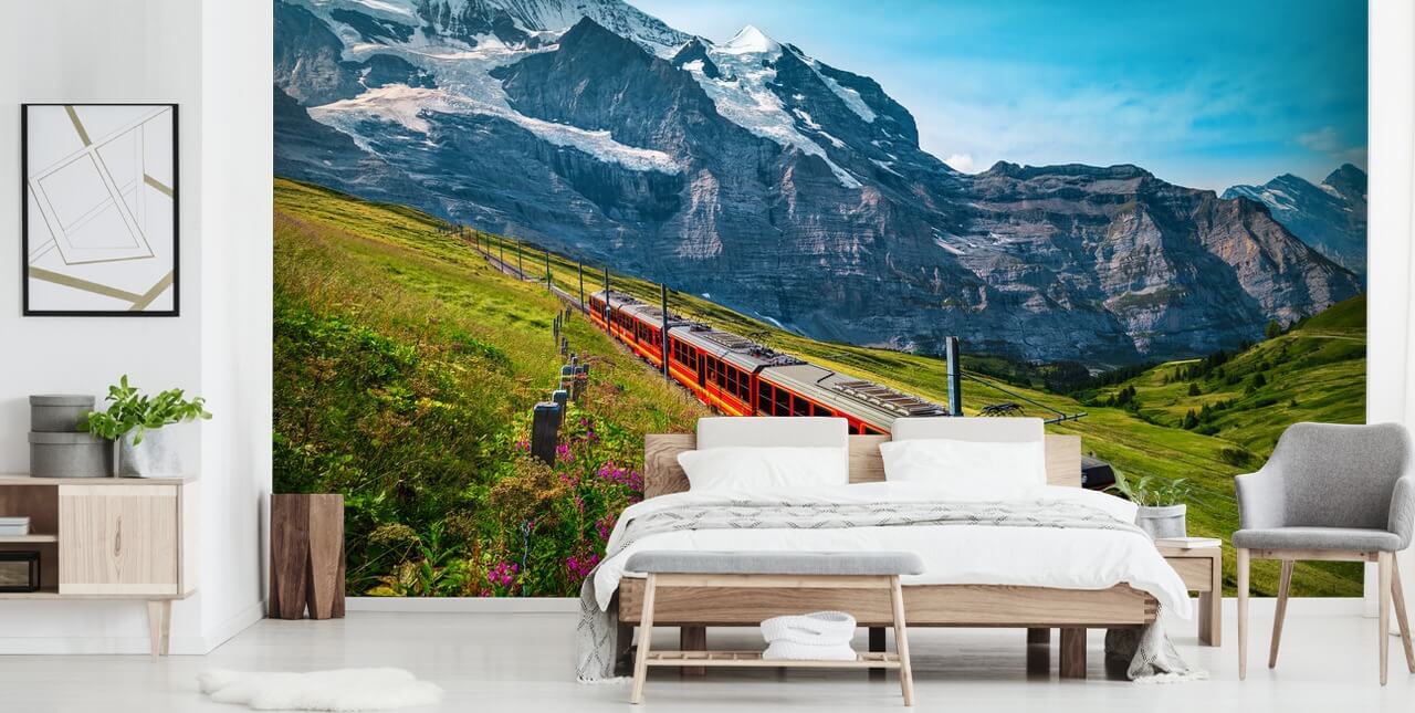 tren eléctrico rojo pasando por los alpes suizos fondo
