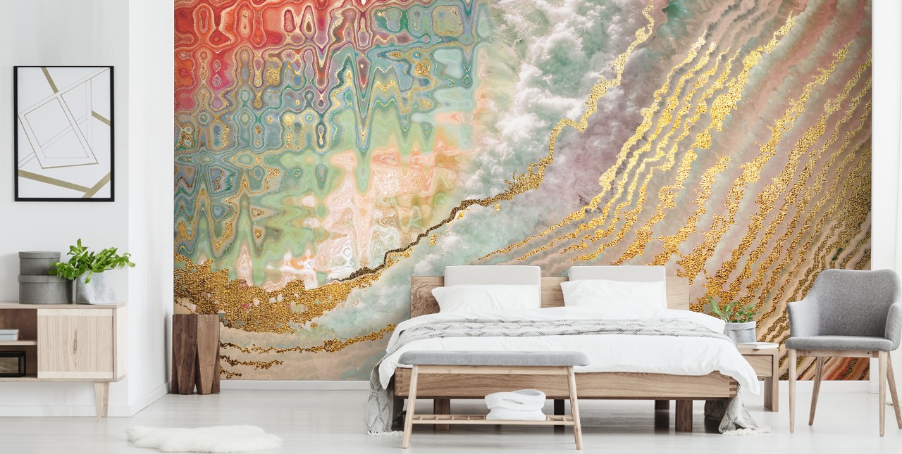 gold colour geode with pink, purple and green shades wallpaper