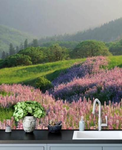 light purple and pink wild flowers in field with green hills wallpaper light purple and pink wild flowers in field with green hills wallpaper