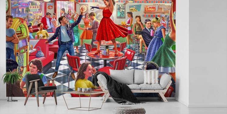 Rockers degli anni '50 che ballano in una tavola calda