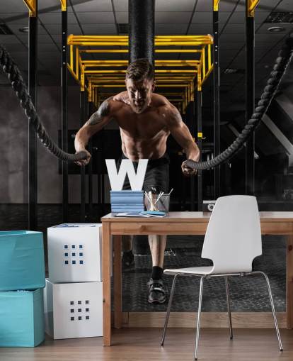 tumma kuntosali miehen kanssa raskailla köysillä taustakuvalla tumma kuntosali miehen kanssa raskailla köysillä taustakuvalla