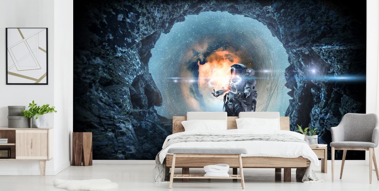 astronaut in ruimtegrot behang