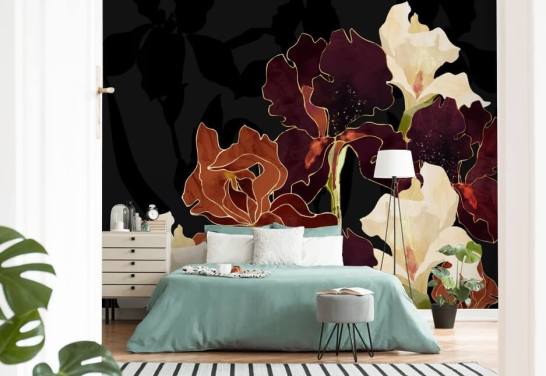 Black background with a mixture of purple, brown and white iris flowers