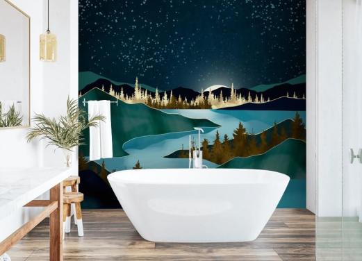 Navy sky over green mountains with a light blue river