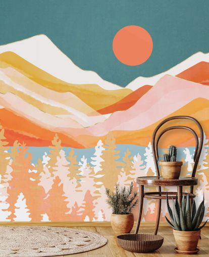 Orange and yellow mountains and forest with a teal sky and orange sun Orange and yellow mountains and forest with a teal sky and orange sun