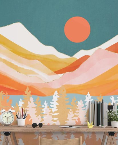 Orange och gula berg och skog med en kricka himmel och orange sol Orange och gula berg och skog med en kricka himmel och orange sol