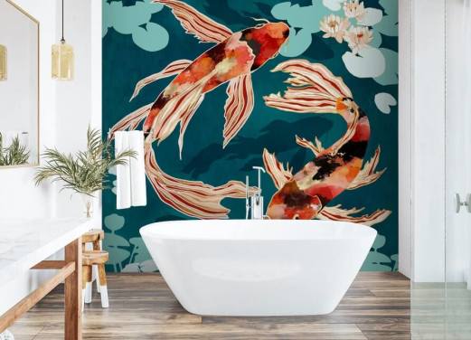 Orange koi svømming i en blå dam med turkise lilje pads