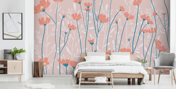 Fond rose poudré avec des fleurs de pêche et des tiges bleues