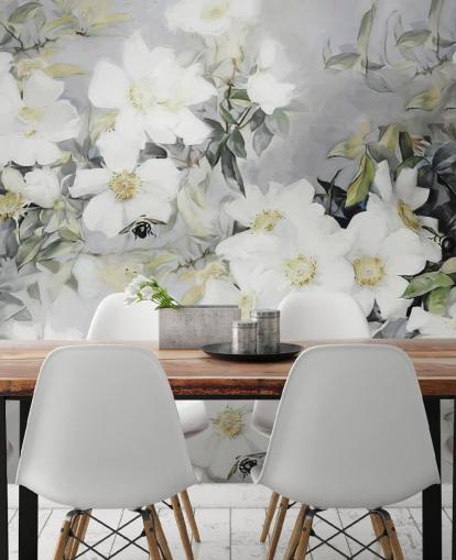 Fond gris avec des fleurs blanches et des feuilles vertes atténuées Fond gris avec des fleurs blanches et des feuilles vertes atténuées