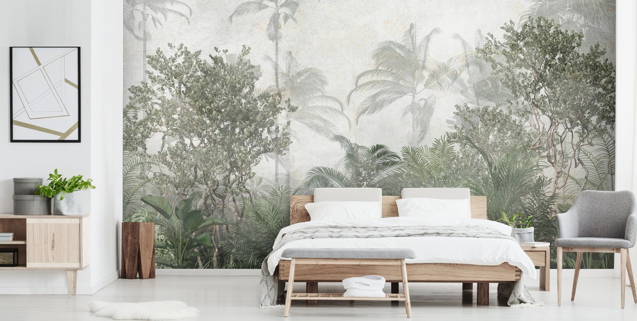Tall tropical green jungle trees in a jungle with a soft haze wallpaper