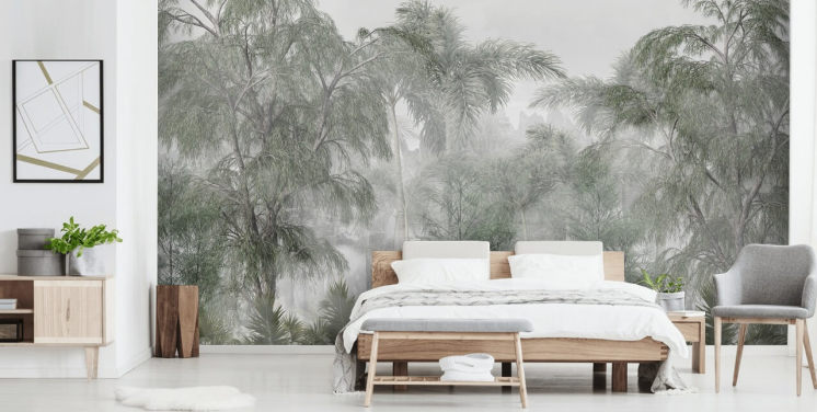 Tall green jungle trees and palm trees with a soft haze wallpaper