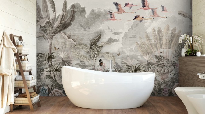 Muted green palm trees and jungle trees with light pink flowers and flying pink flamingo birds wallpaper