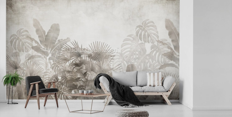 neutral beige jungle wallpaper with tropical trees and a hazy white sky