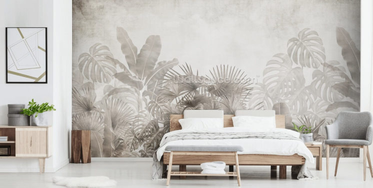 neutral beige jungle wallpaper with tropical trees and a hazy white sky