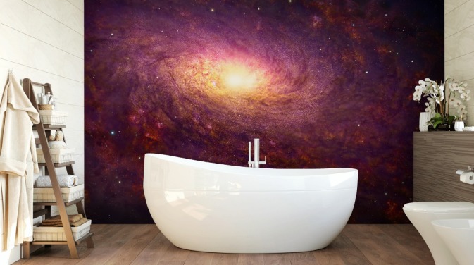 Dark purple swirling galaxy with red swirls and stars with a bright center wallpaper