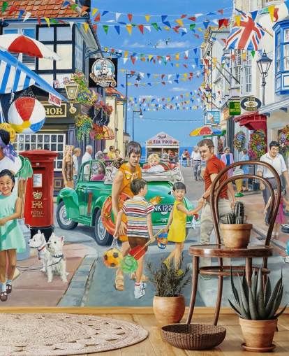 Colorida calle principal junto al mar con pancartas, tiendas y banderines Colorida calle principal junto al mar con pancartas, tiendas y banderines