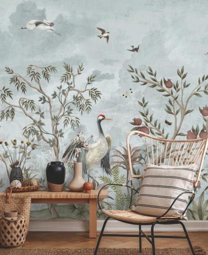 Blue, watercolour sky with growing trees and vines with dark pink roses, flying birds and white and blue egret birds in a chinoiserie style wallpaper Blue, watercolour sky with growing trees and vines with dark pink roses, flying birds and white and blue egret birds in a chinoiserie style wallpaper