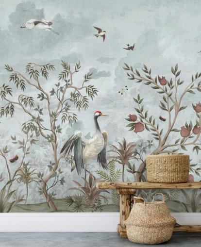 Blue, watercolour sky with growing trees and vines with dark pink roses, flying birds and white and blue egret birds in a chinoiserie style wallpaper Blue, watercolour sky with growing trees and vines with dark pink roses, flying birds and white and blue egret birds in a chinoiserie style wallpaper