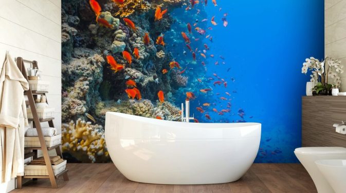 Decorazione murale con pesci arancioni e corallo
