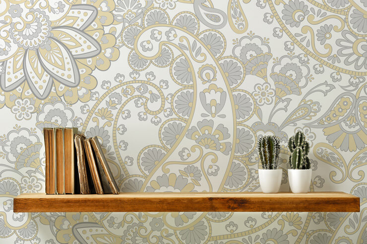retro floral pattern wallpaper in grey and yellow tones with wallpaper shelves