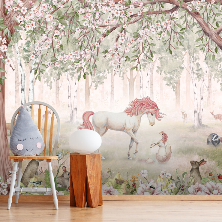 pink unicorn wallpaper mural in girls playroom