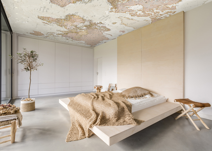 world map ceiling mural in bedroom